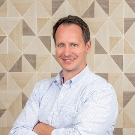 Photo of Dr. David Wickness smiling.
